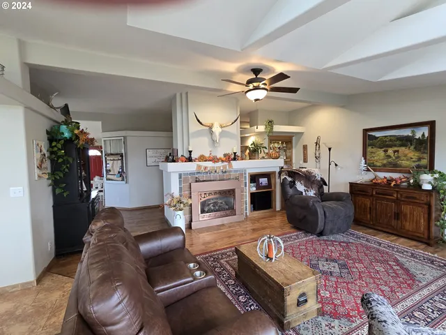 a kitchen with large windows and a sink