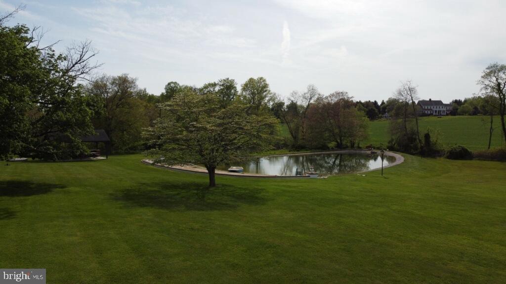 28814 Kemptown Road Damascus, MD 20872 - Photo 46 of 49 a view of a golf course with a lake