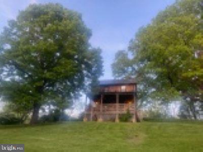 12498 Crest Hill Road Hume, VA 22639 - Photo 11 of 13 Charming cabin nestled among trees.