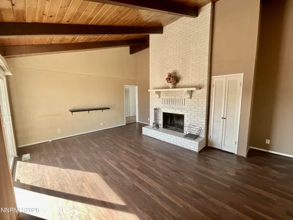 a kitchen with a sink stove and refrigerator