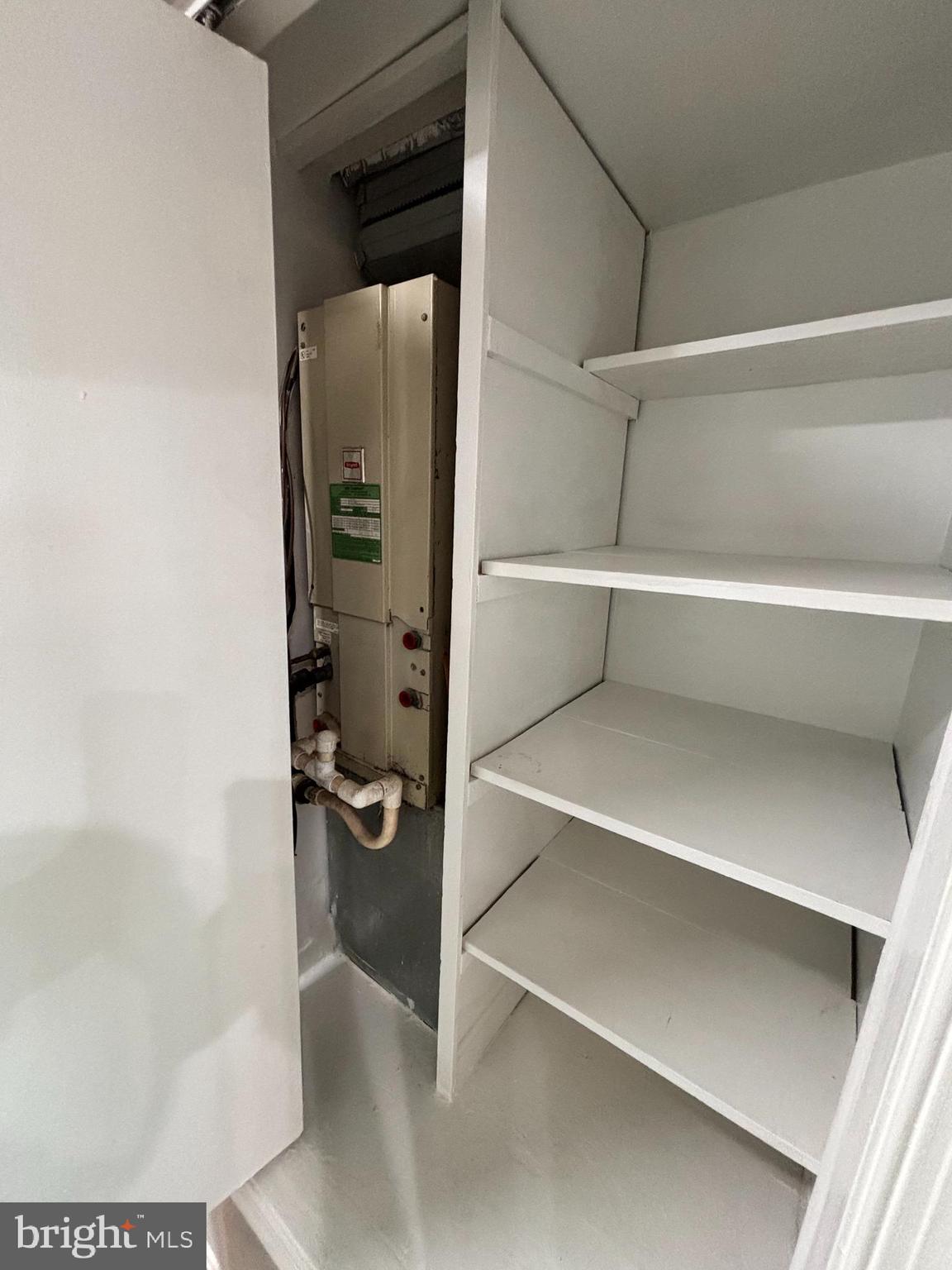 3810 V Street Southeast, Unit 301 Washington, DC 20020 - Photo 19 of 30 Storage/Linen Closet & Furnace Location