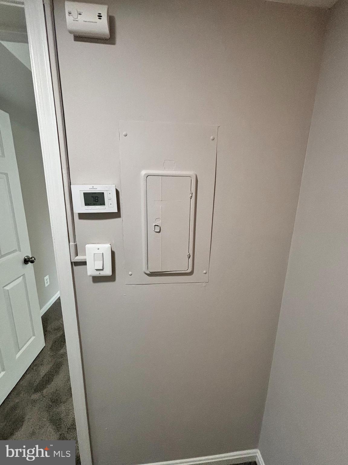 3810 V Street Southeast, Unit 301 Washington, DC 20020 - Photo 21 of 30 Programmable Thermostat & Electric Panel Location
