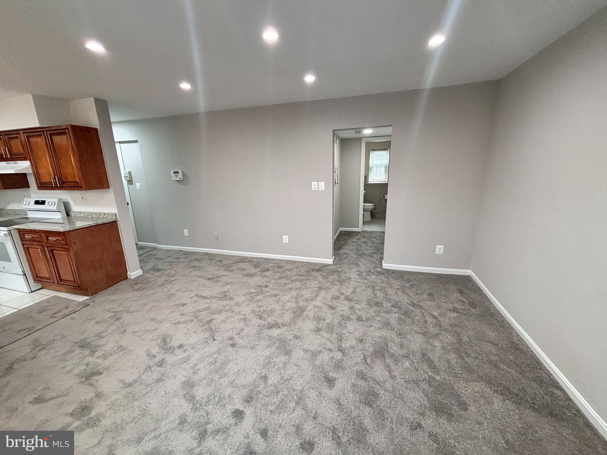 3810 V Street Southeast, Unit 301 Washington, DC 20020 - Photo 5 of 30 View of Living Room with recessed light