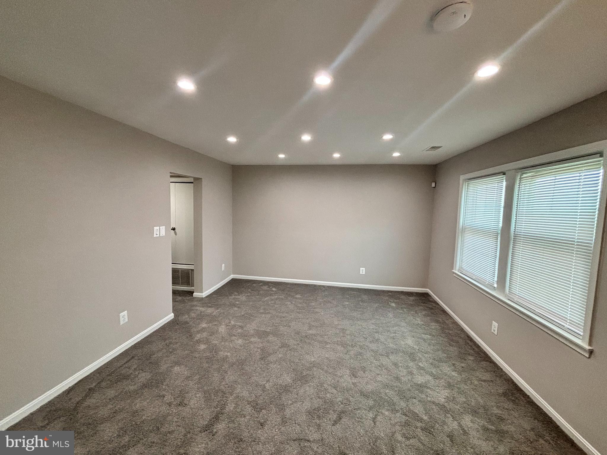 3810 V Street Southeast, Unit 301 Washington, DC 20020 - Photo 6 of 30 LR View w/ new carpeting & lots of natural light