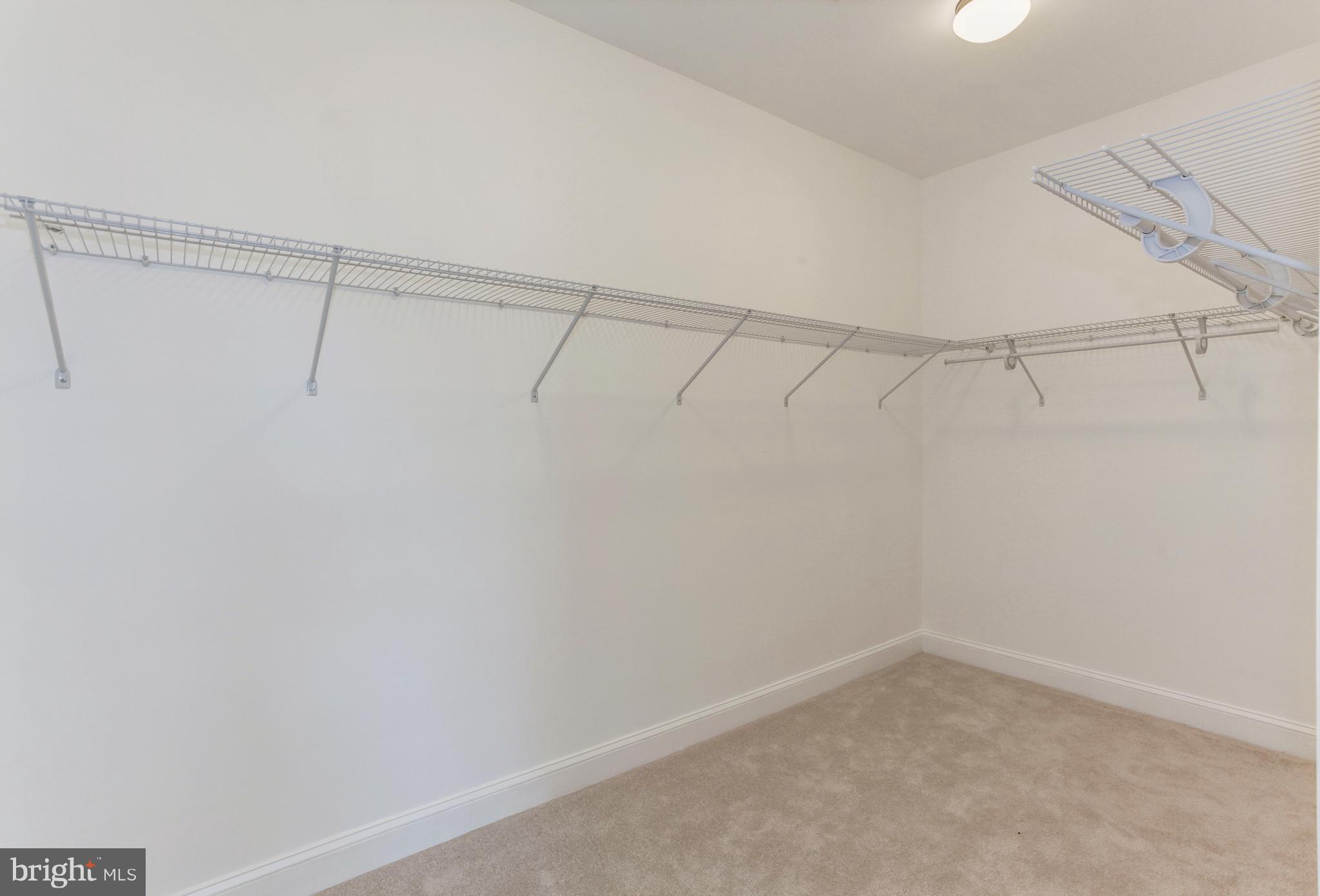 7505 June Street Springfield, VA 22150 - Photo 22 of 29 a view of a room with racks on the wall