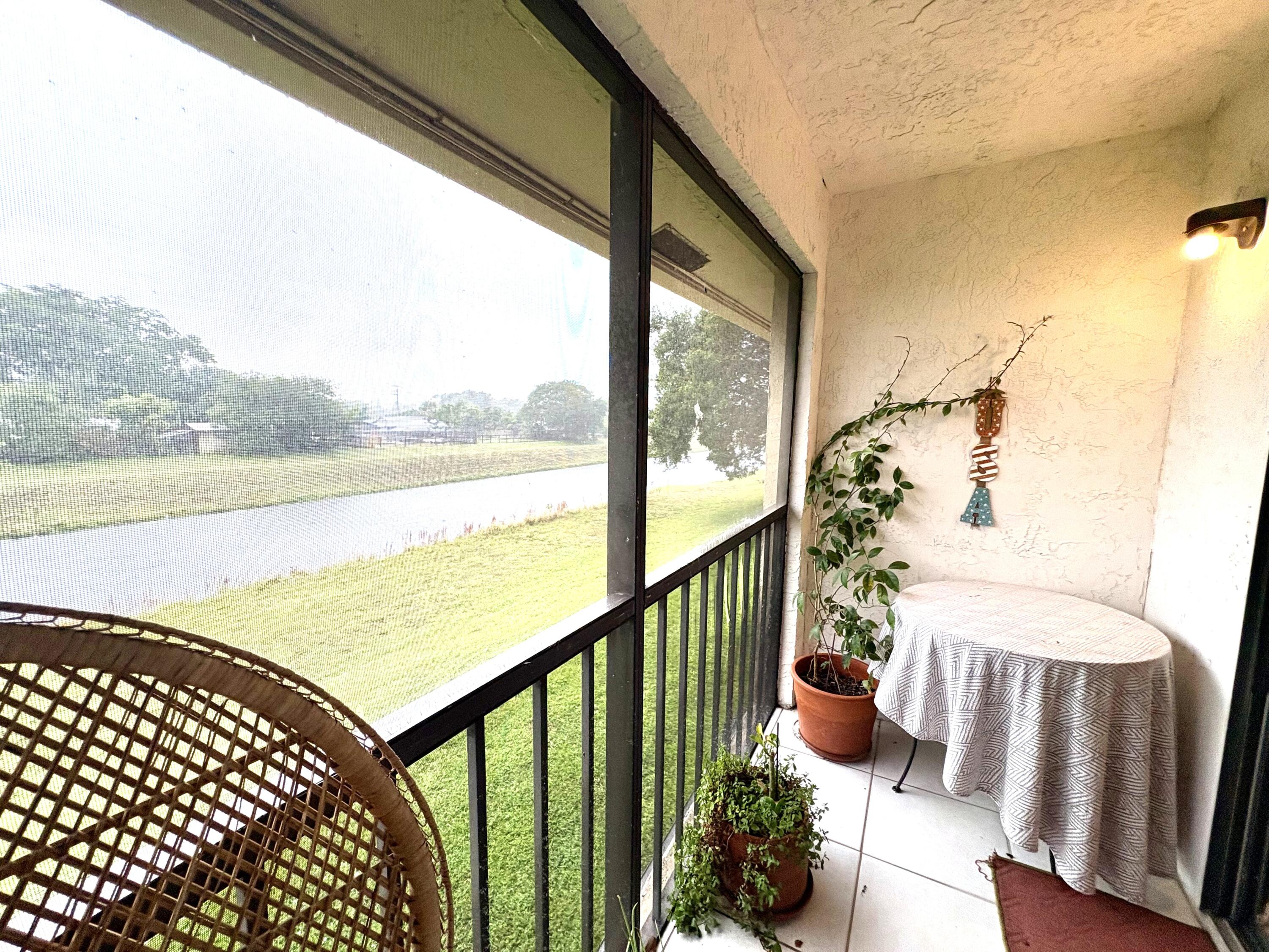 9485 Boca Cove Circle, Unit 709 Boca Raton, FL 33428 - Photo 35 of 42 a view of balcony with furniture