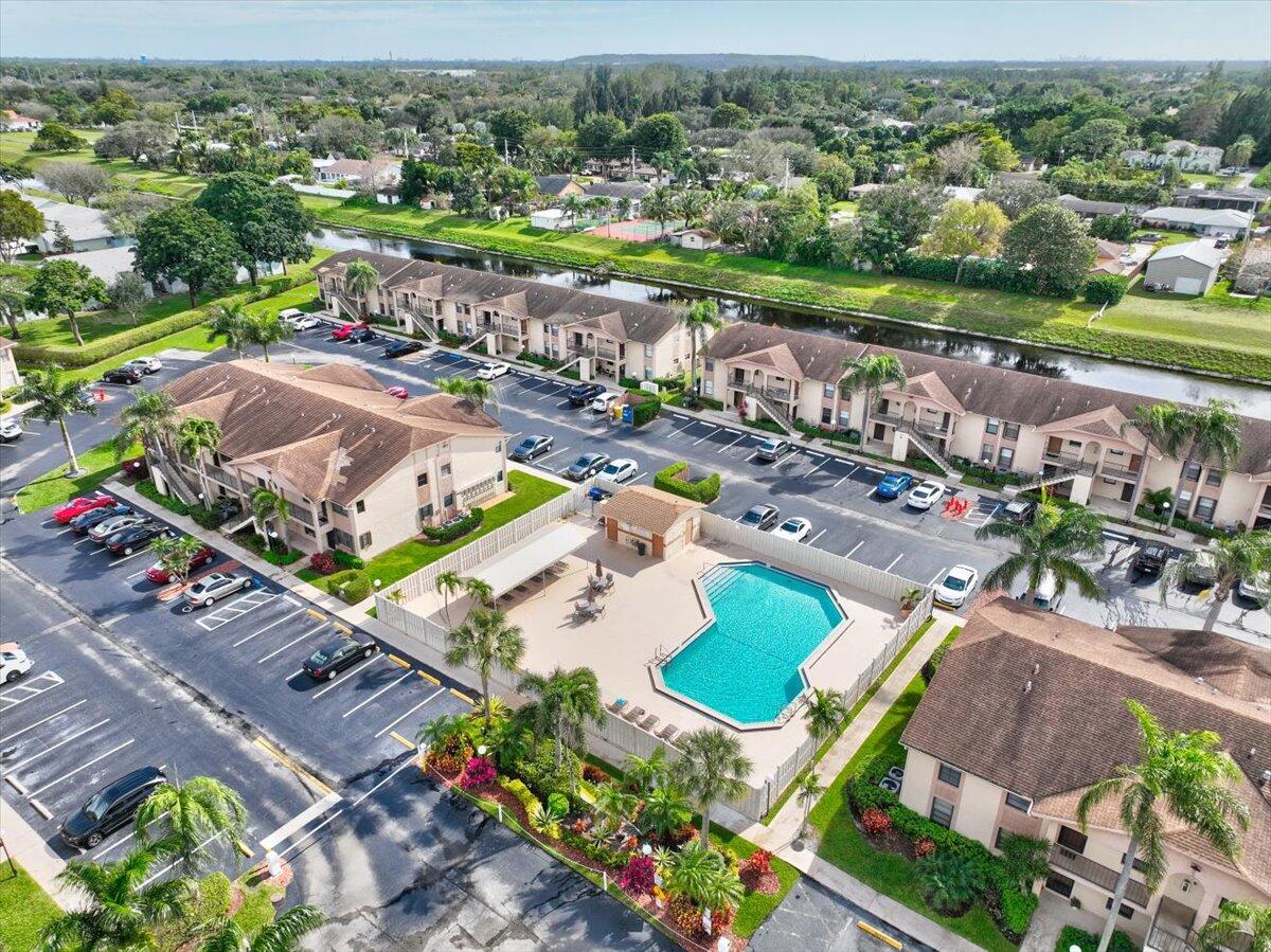 9485 Boca Cove Circle, Unit 709 Boca Raton, FL 33428 - Photo 37 of 42 an aerial view of a house with a garden