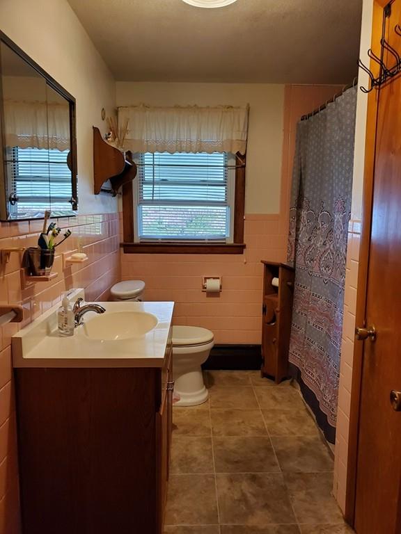 2 Glenn Street Three Rivers, MA 01080 - Photo 17 of 17 a bathroom with a sink toilet and shower