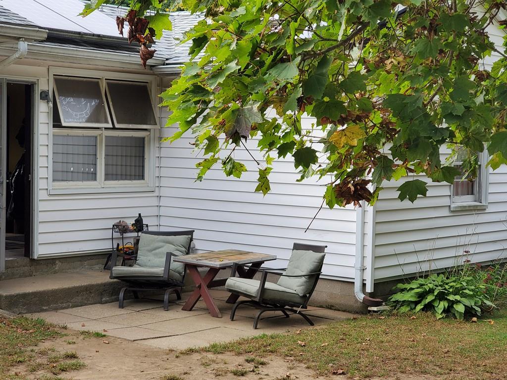 2 Glenn Street Three Rivers, MA 01080 - Photo 3 of 17 a view of a bench in the backyard