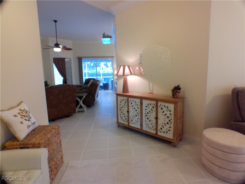 4780 Martinique Way Naples, FL 34119 - Photo 23 of 49 a living room with furniture