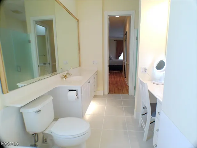 a view of a lake with a yard