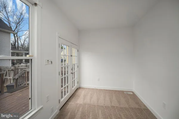 a view of a hallway with an empty space