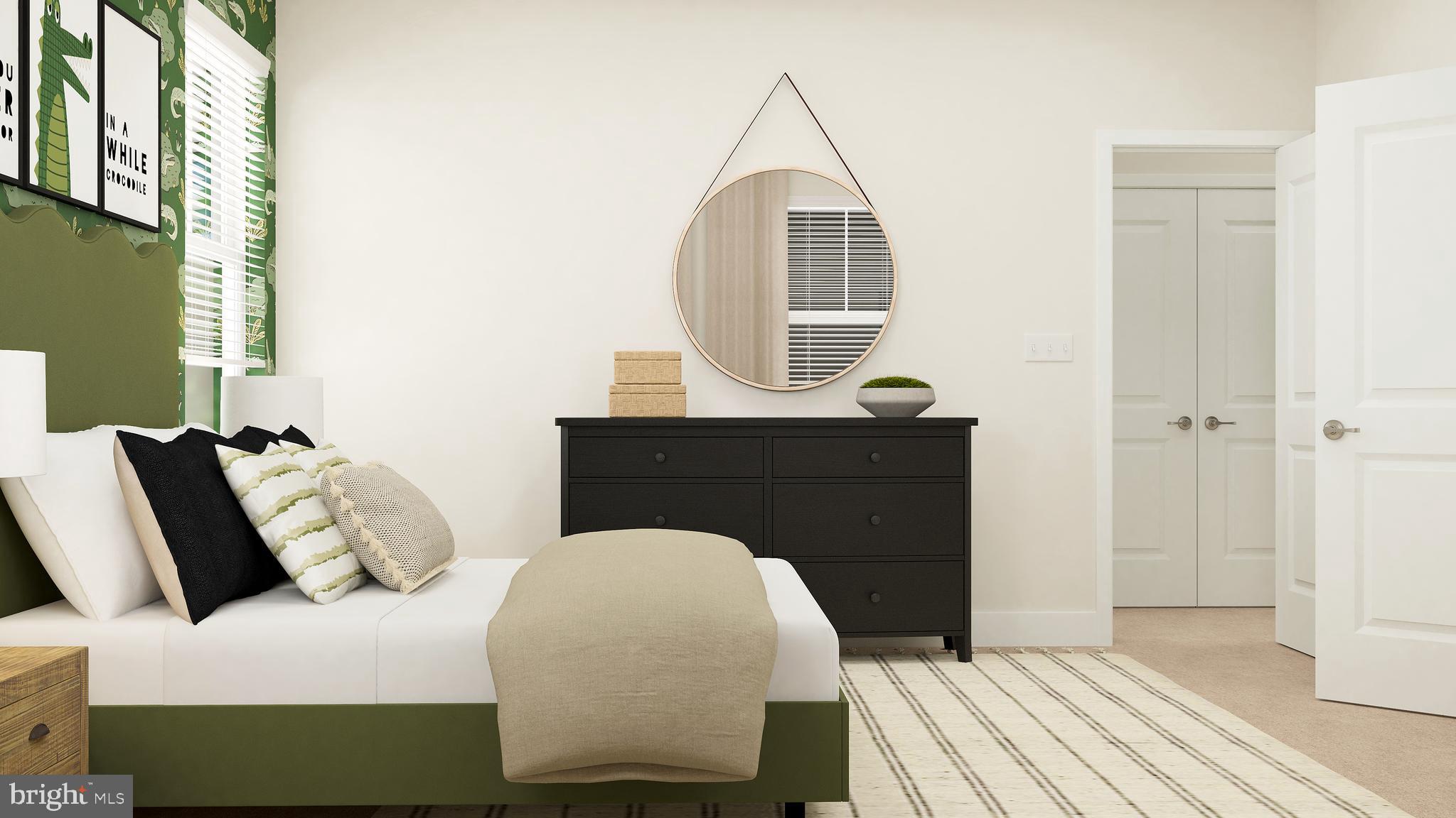 6611 Greenleigh Avenue Middle River, MD 21220 - Photo 17 of 39 a bedroom with a bed a mirror and a window