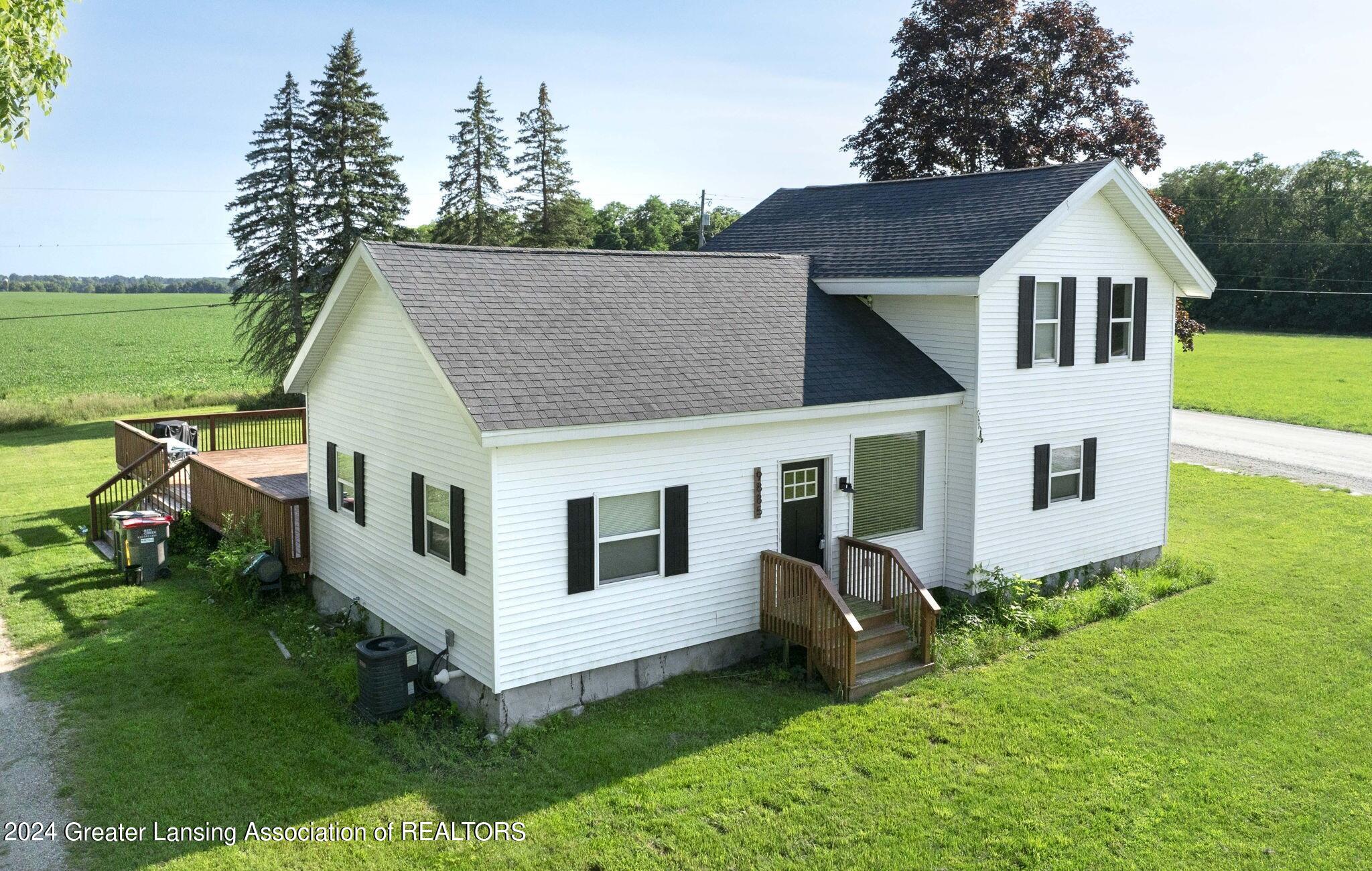 9885 Peck Lake Road Lowell, MI 49331 - Photo 1 of 56 Exterior