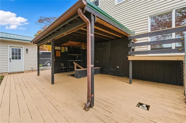a patio with table and chairs