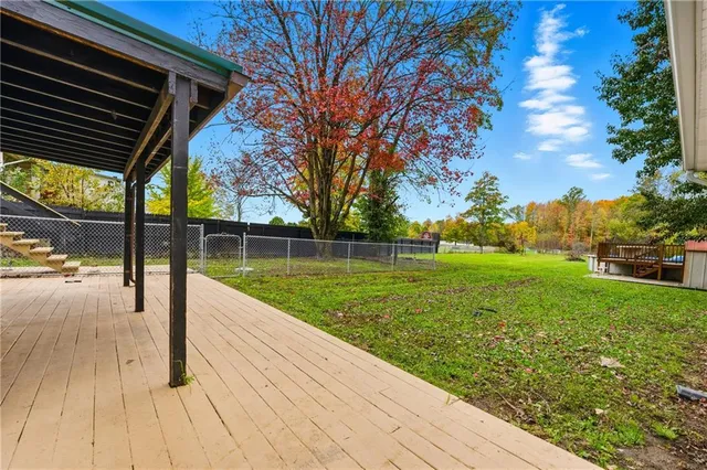a view of a garden and basketball court