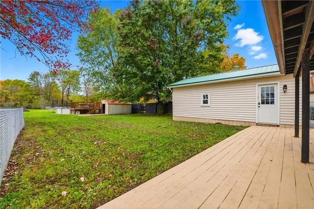 a view of a backyard with a garden
