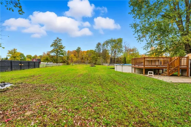 a view of a garden with houses