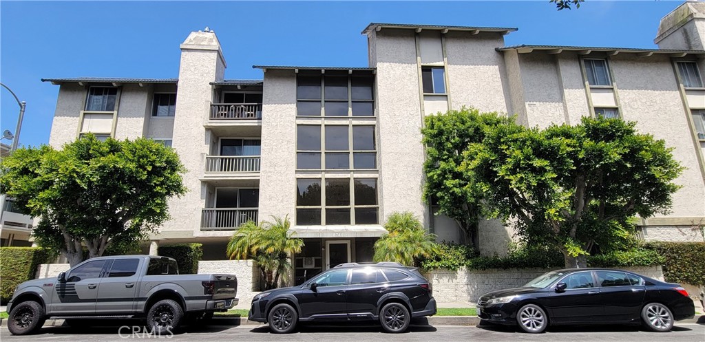 8740 Tuscany Avenue Playa del Rey, CA 90293 - Photo 2 of 21 a car parked in front of a house