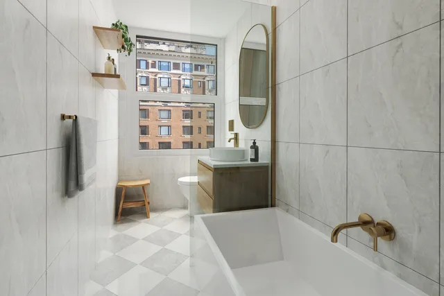 a bedroom with a large bed and a painting on the wall