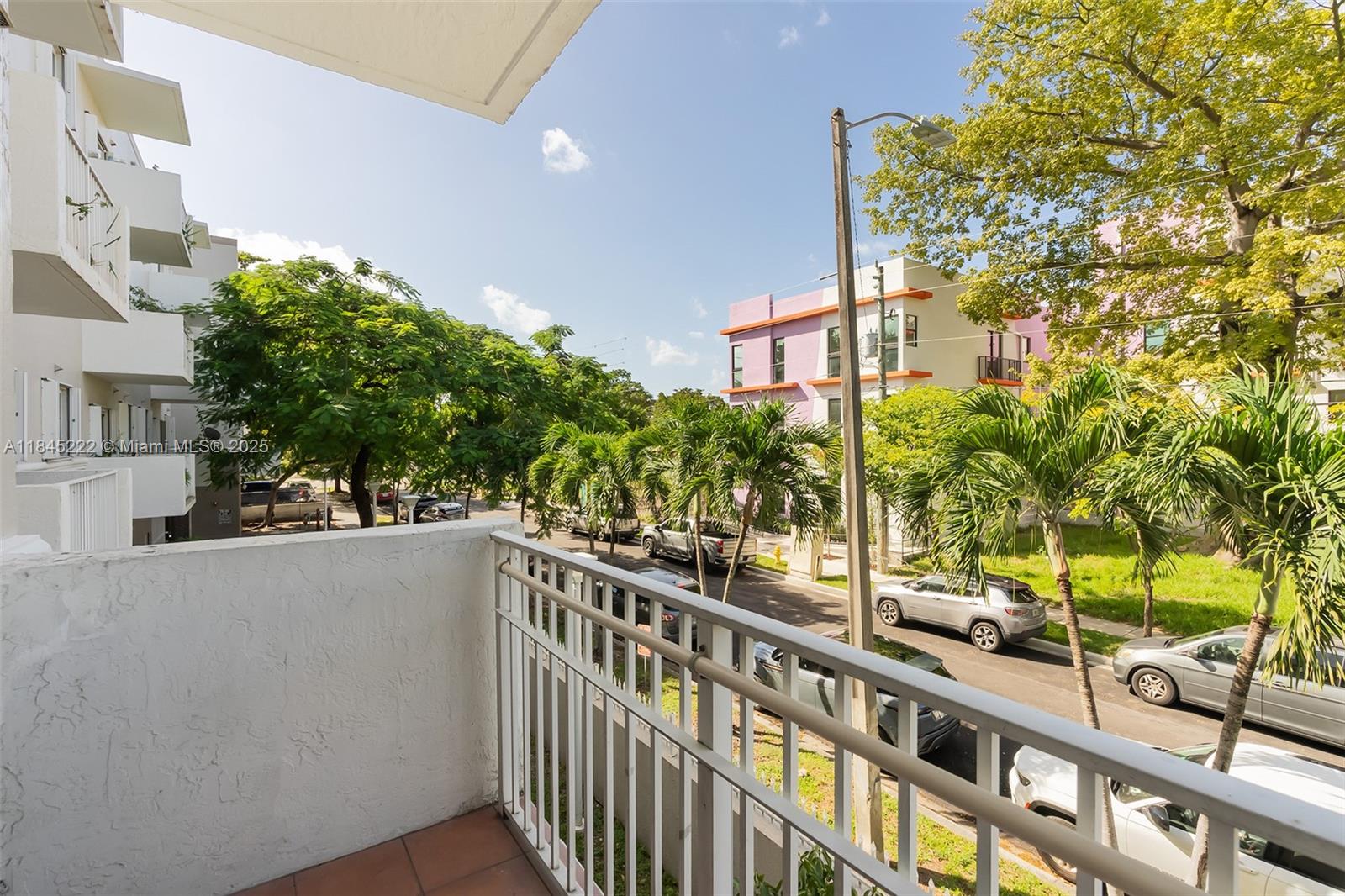 1060 Northwest 7th Street, Unit 101 Miami, FL 33136 - Photo 17 of 20 a view of a building from a balcony
