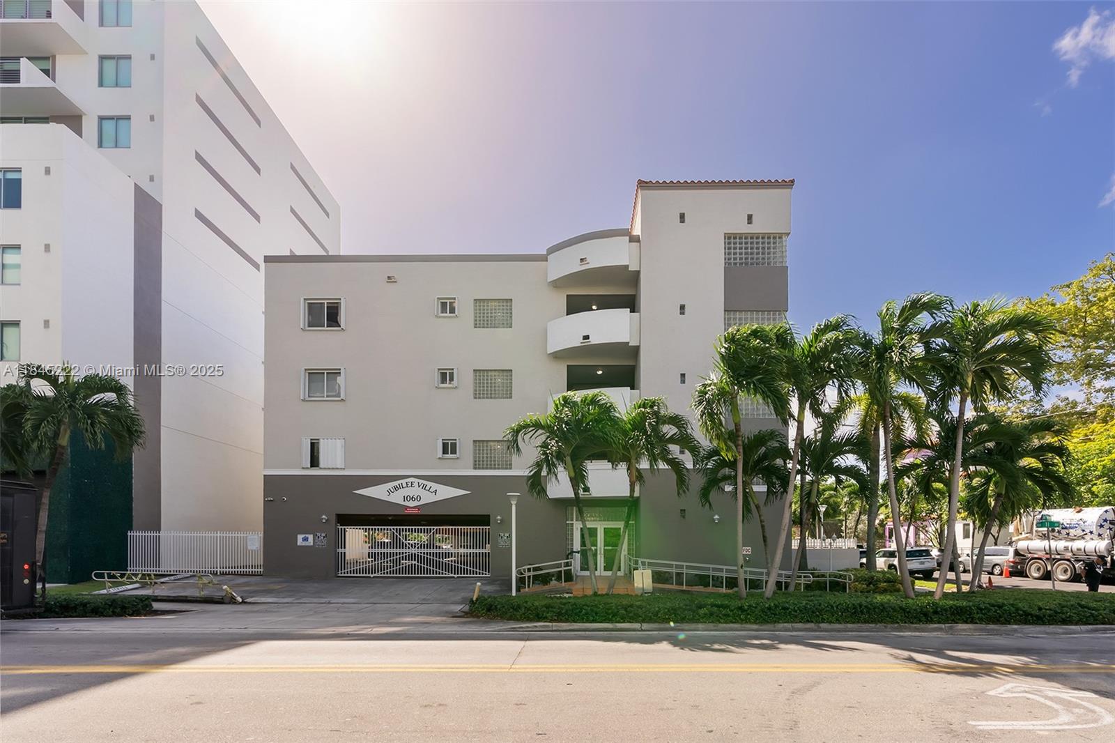 1060 Northwest 7th Street, Unit 101 Miami, FL 33136 - Photo 19 of 20 front view of a building with a garden