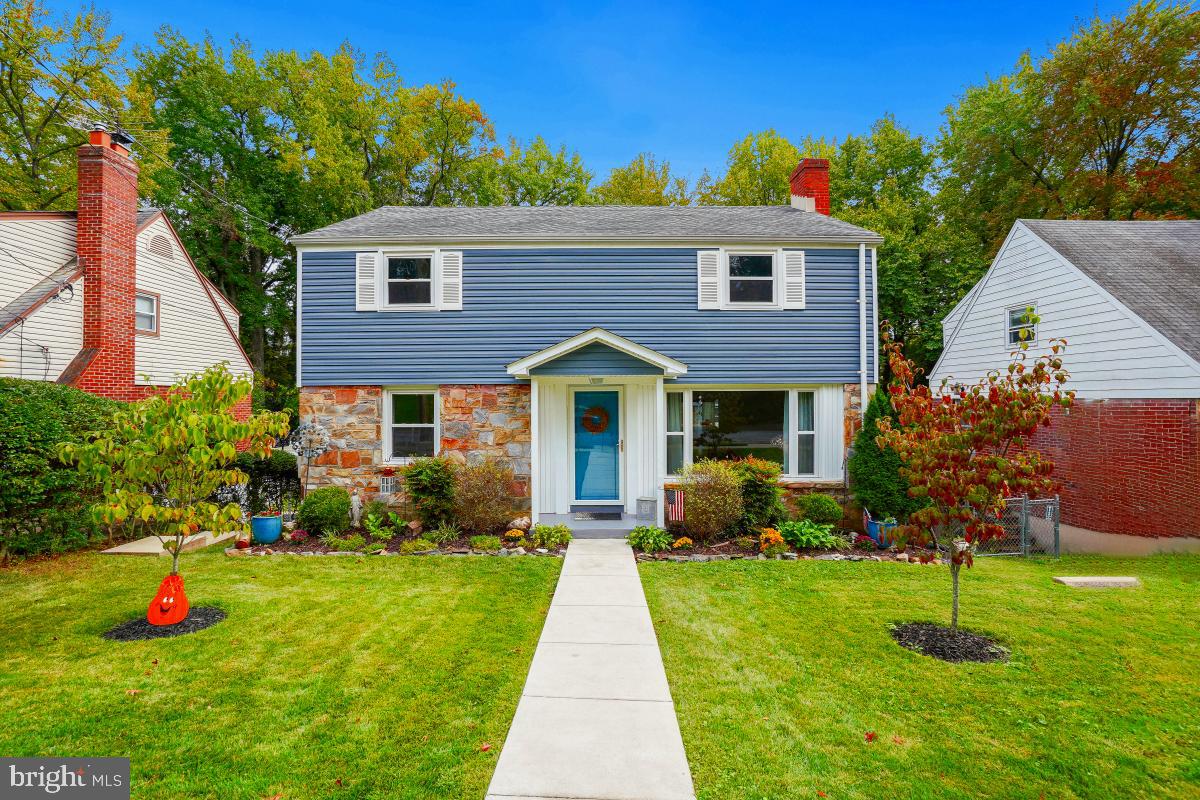 6013 Hawthorne Street Cheverly, MD 20785 - Photo 1 of 30 a front view of house with yard and green space