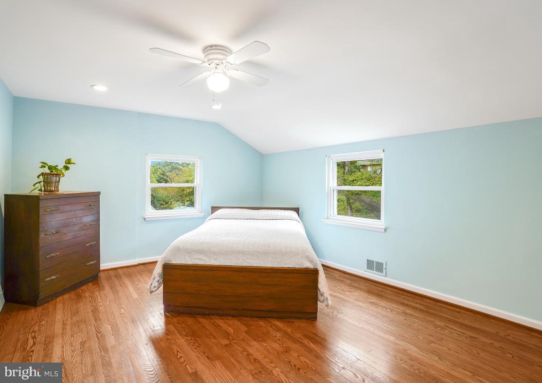 6013 Hawthorne Street Cheverly, MD 20785 - Photo 19 of 30 a bedroom with a bed and a dresser