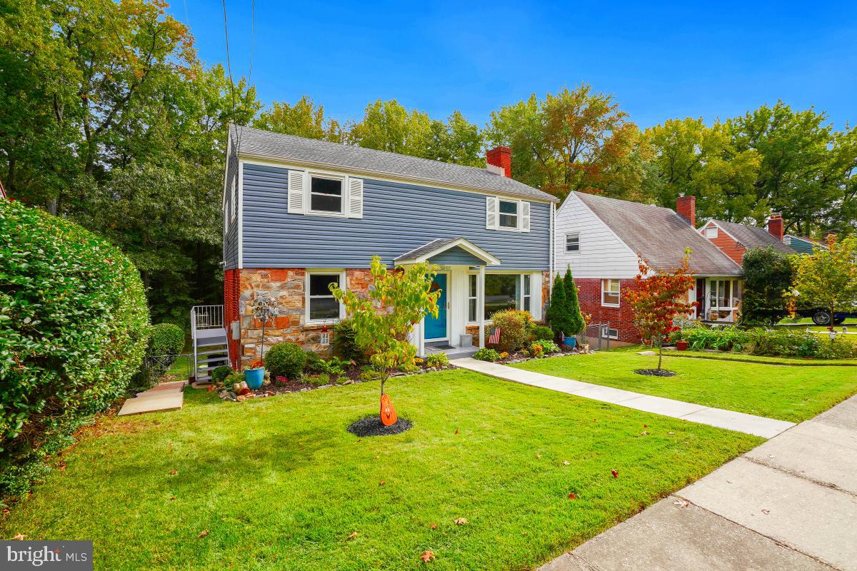 6013 Hawthorne Street Cheverly, MD 20785 - Photo 2 of 30 a front view of house with yard and outdoor seating