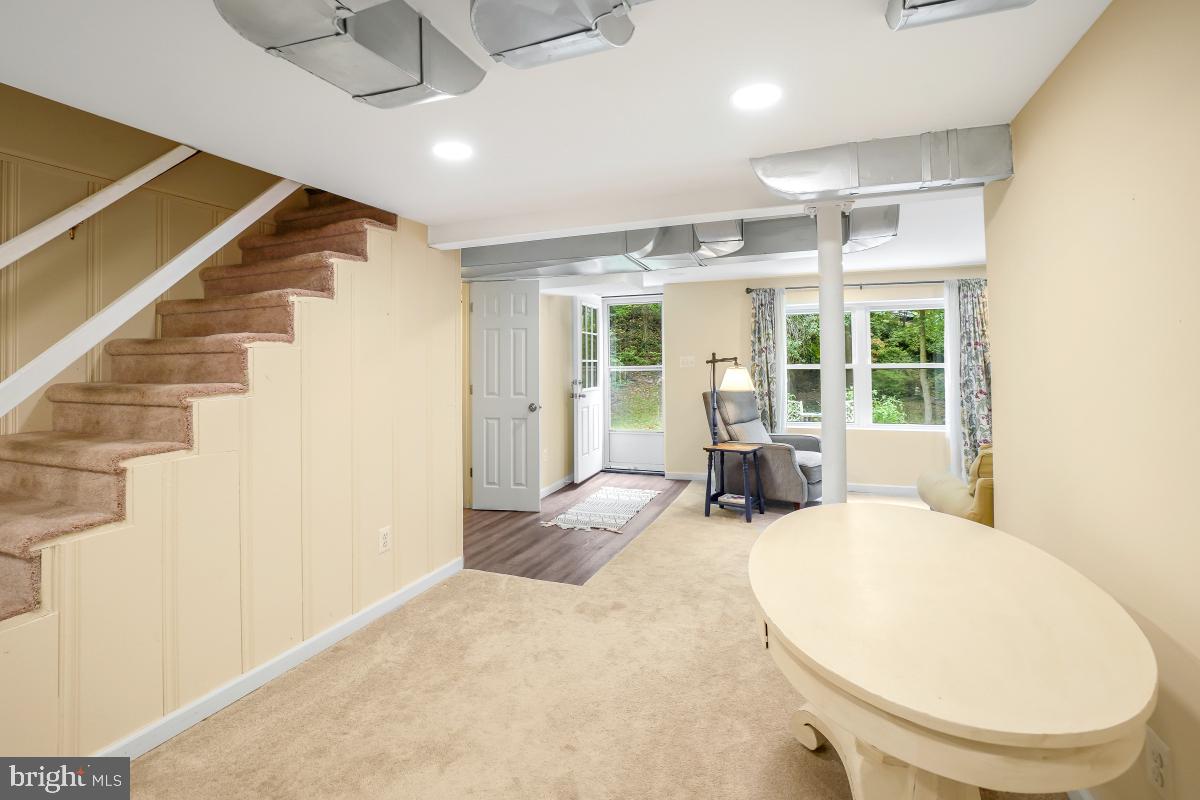 6013 Hawthorne Street Cheverly, MD 20785 - Photo 21 of 30 a view of a livingroom with furniture and staircase