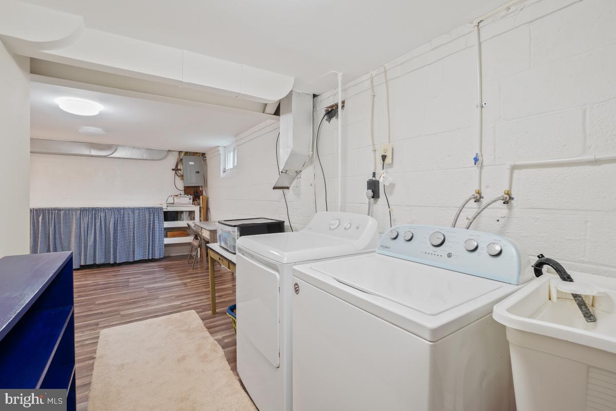 6013 Hawthorne Street Cheverly, MD 20785 - Photo 25 of 30 a view of a kitchen with sink and refrigerator