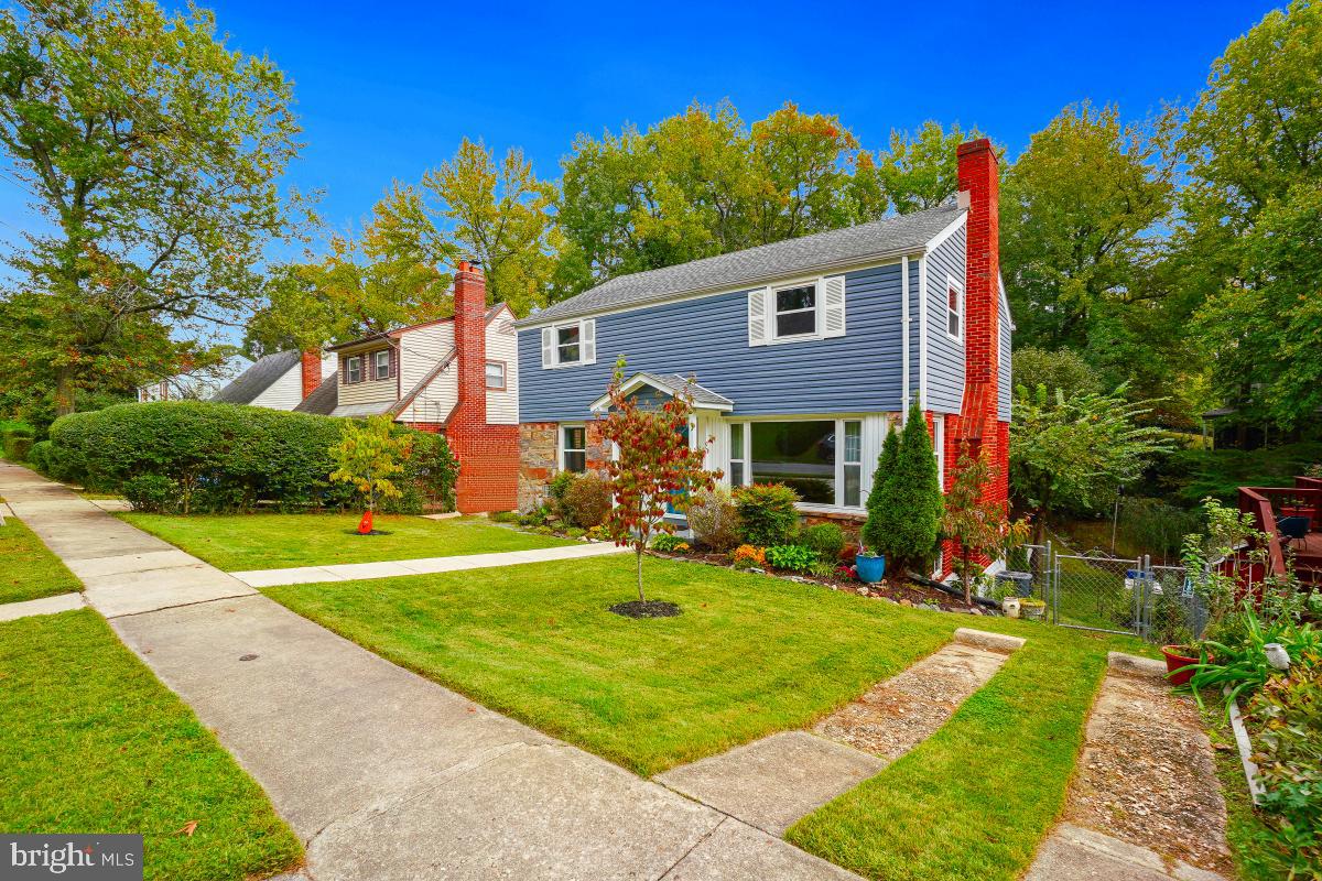 6013 Hawthorne Street Cheverly, MD 20785 - Photo 3 of 30 a aerial view of a house with swimming pool and garden