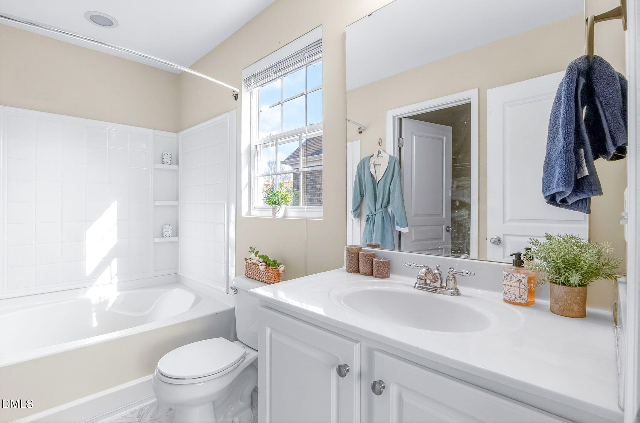 603 Cupola Drive Raleigh, NC 27603 - Photo 24 of 32 a bathroom with a sink toilet and shower