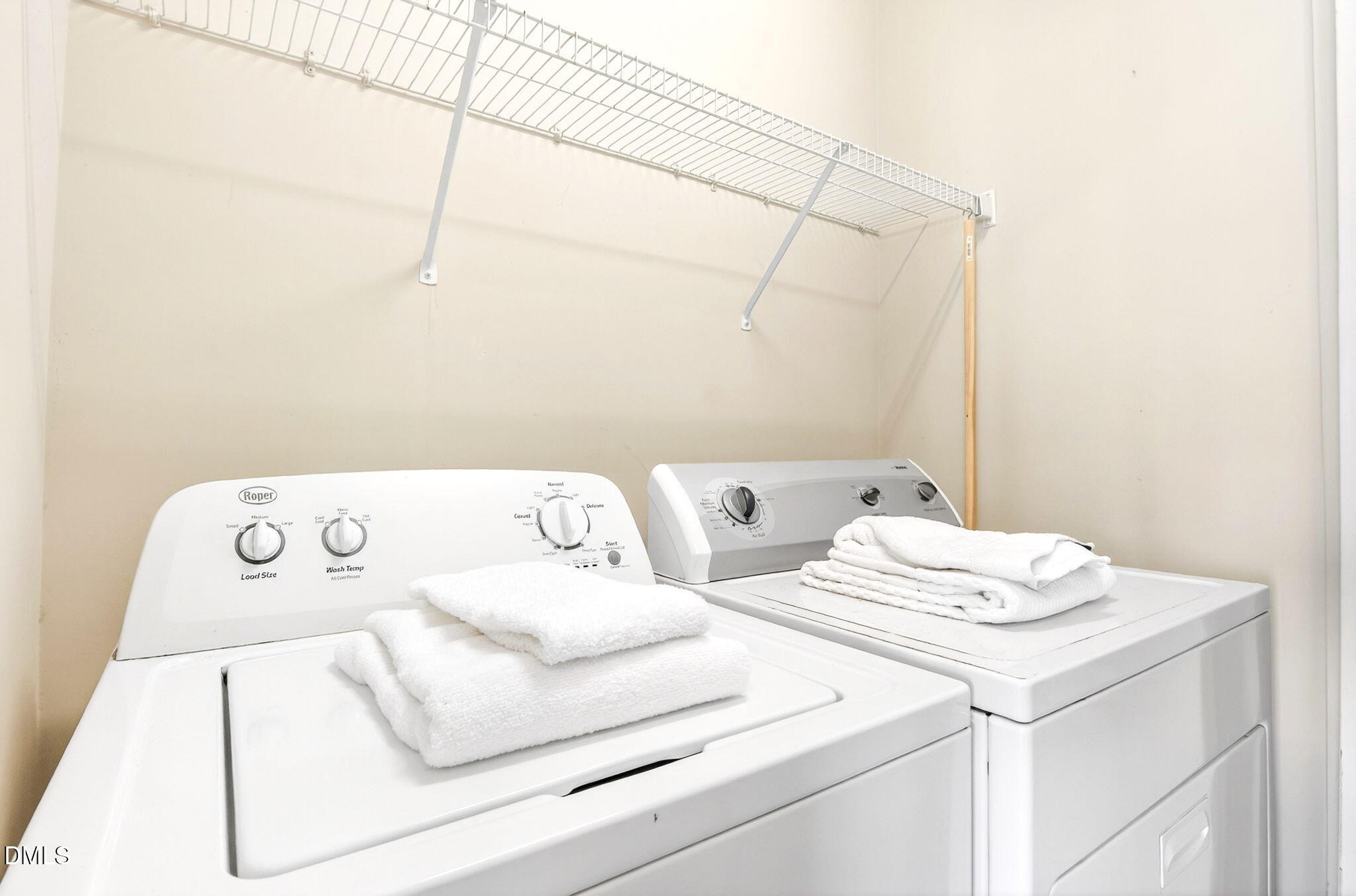603 Cupola Drive Raleigh, NC 27603 - Photo 29 of 32 a utility room with dryer and washer