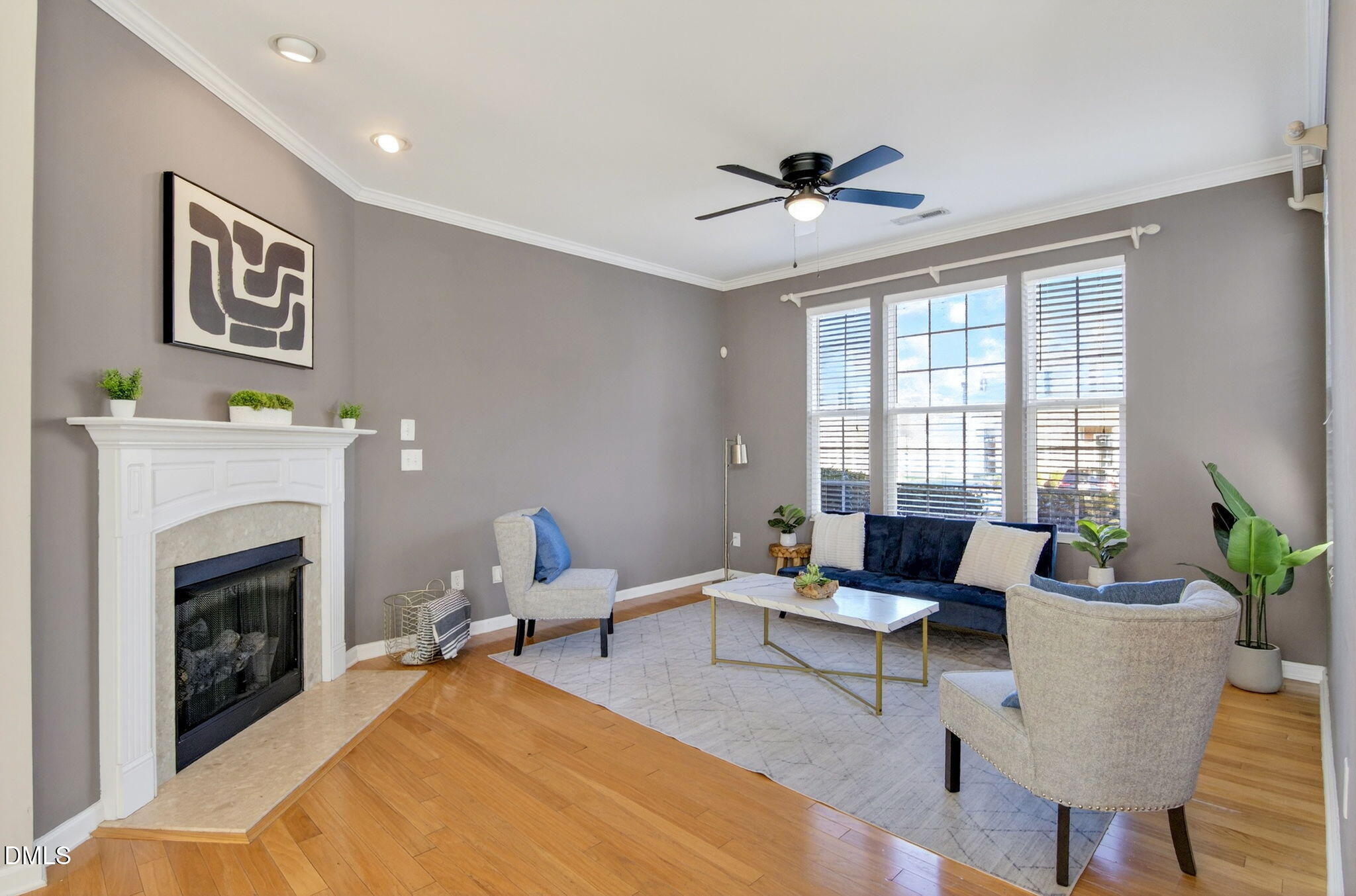 603 Cupola Drive Raleigh, NC 27603 - Photo 4 of 32 a living room with furniture and a fireplace
