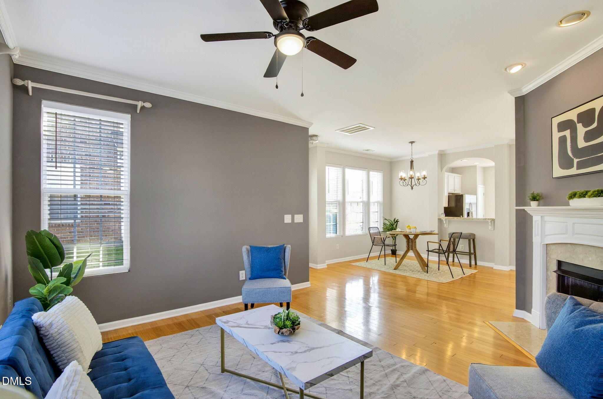 603 Cupola Drive Raleigh, NC 27603 - Photo 6 of 32 a living room with furniture fireplace and a window
