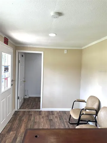 a view of a golf course with a house