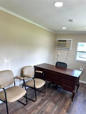 a room with furniture and a window