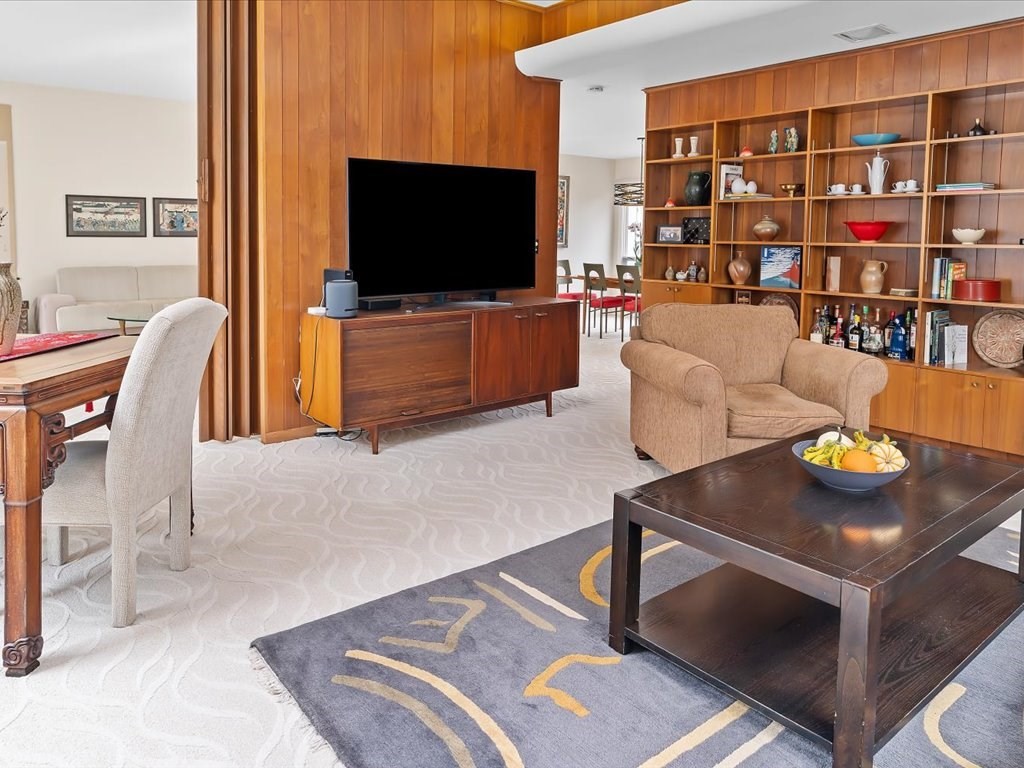 447 Albany Street Fall River, MA 02720 - Photo 15 of 33 a living room with furniture and a flat screen tv