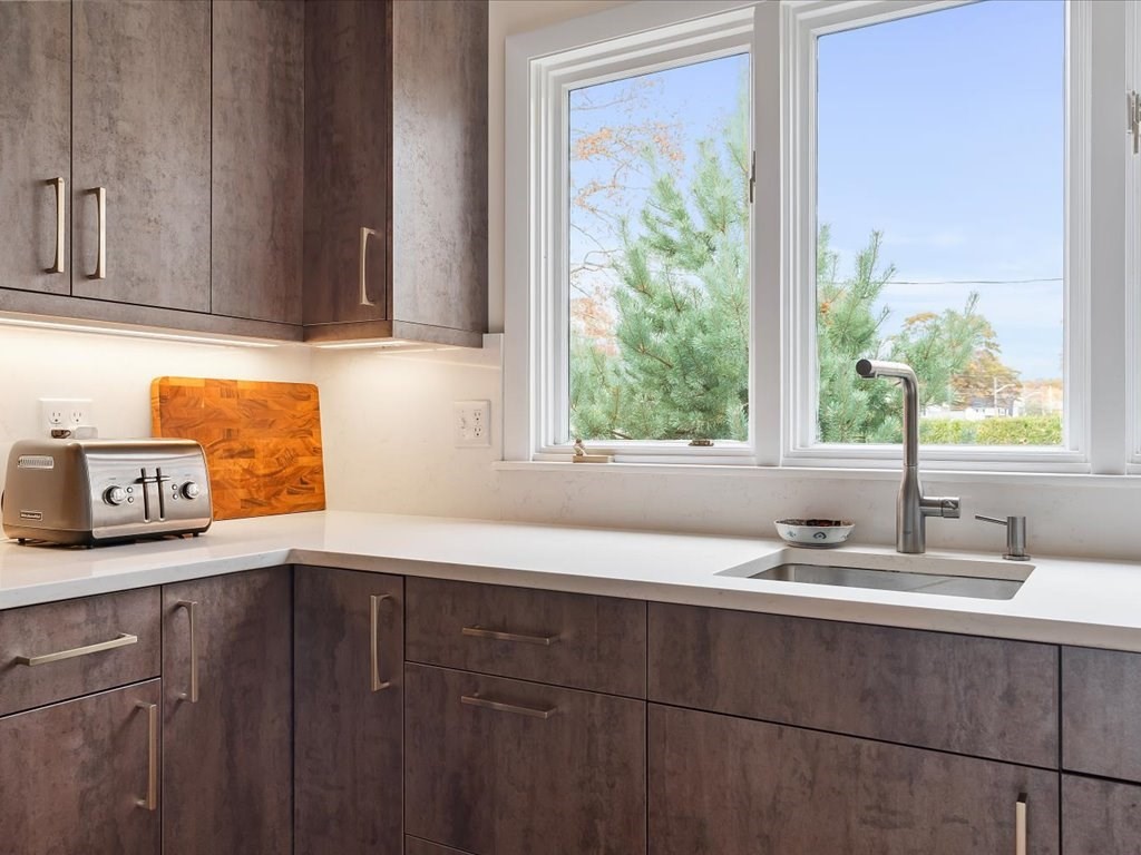 447 Albany Street Fall River, MA 02720 - Photo 23 of 33 a bathroom with a sink and a window
