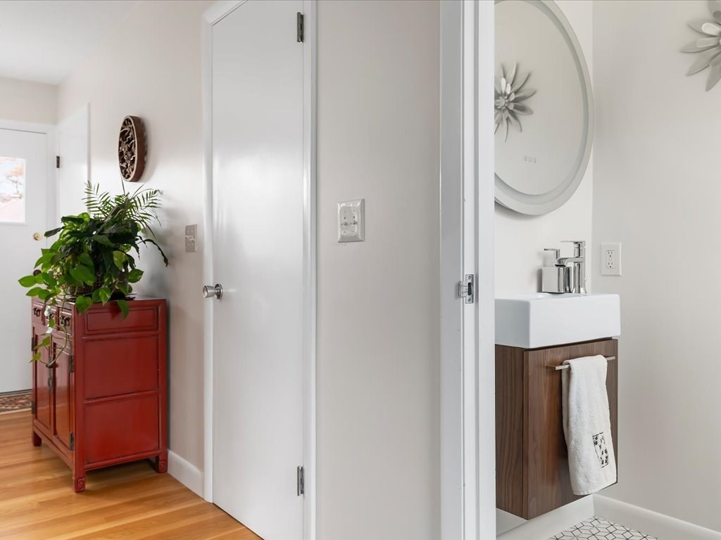 447 Albany Street Fall River, MA 02720 - Photo 24 of 33 a bathroom with a sink and a mirror