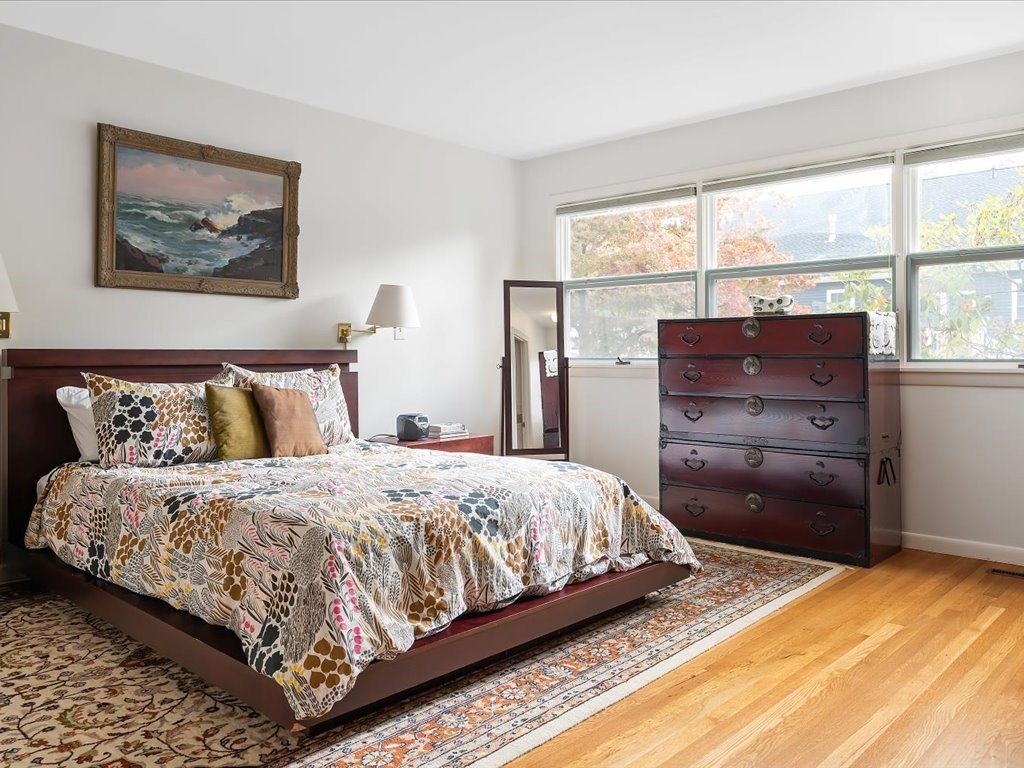 447 Albany Street Fall River, MA 02720 - Photo 26 of 33 a bedroom with a bed and a window