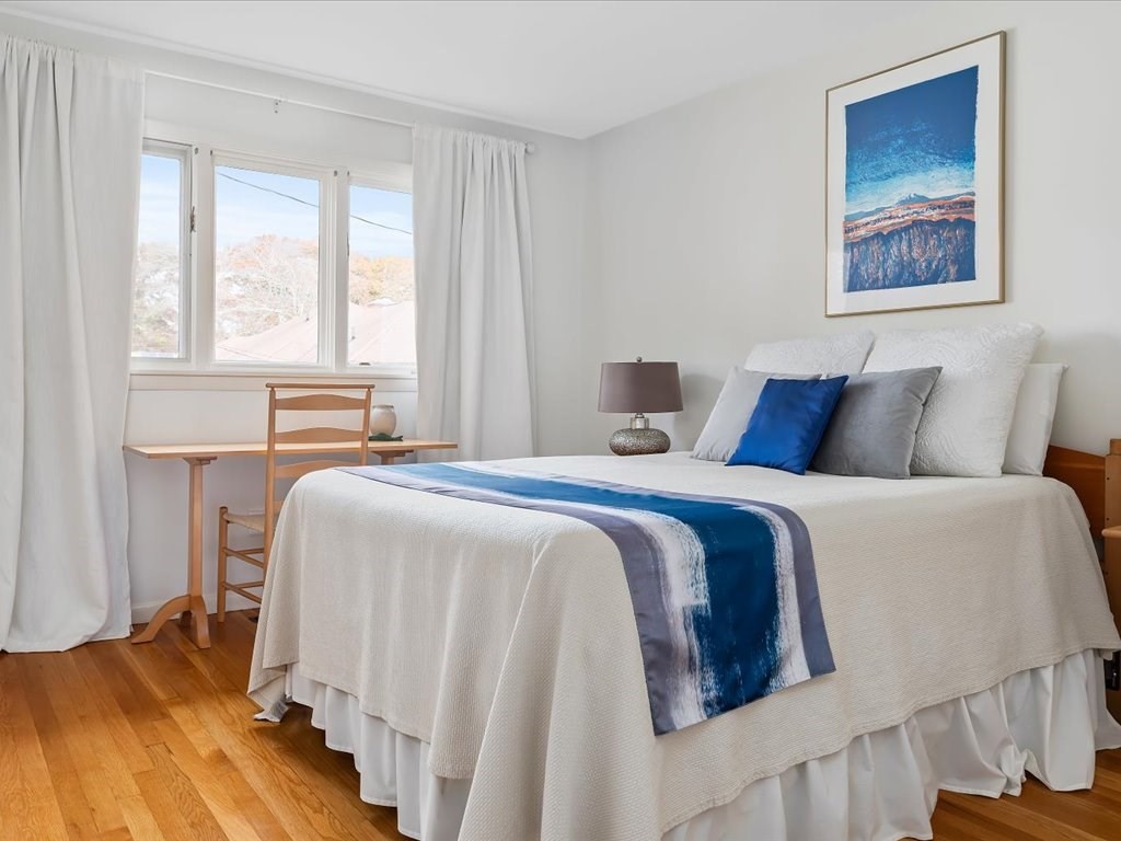 447 Albany Street Fall River, MA 02720 - Photo 29 of 33 a bedroom with a bed and a window