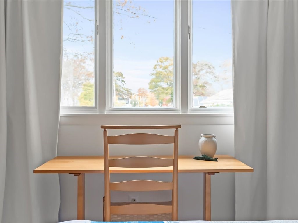 447 Albany Street Fall River, MA 02720 - Photo 30 of 33 a view of a small space with wooden floor and a window