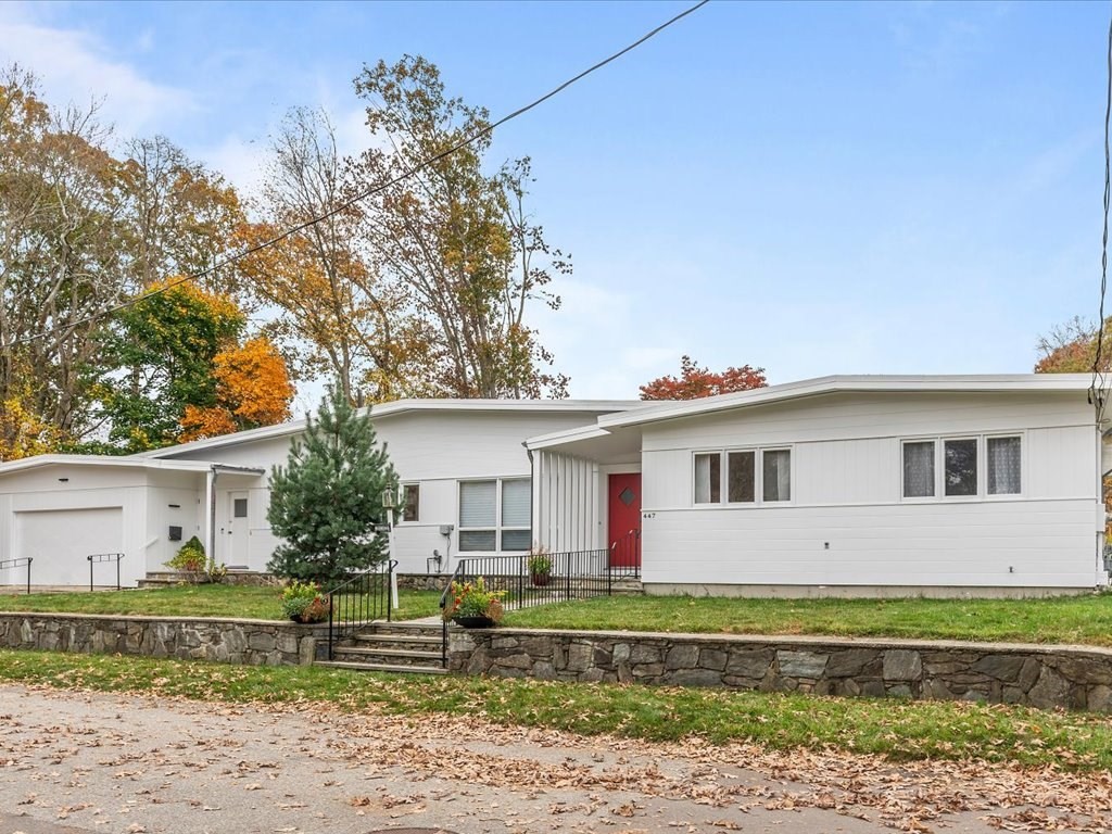 447 Albany Street Fall River, MA 02720 - Photo 4 of 33 a front view of a house with a yard