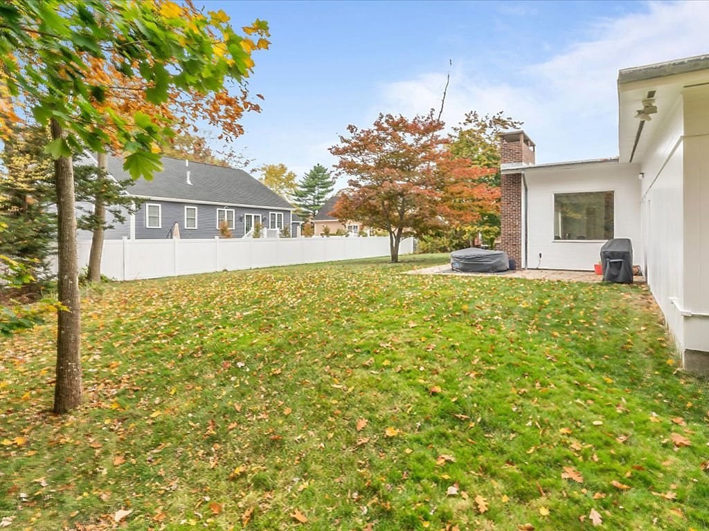 447 Albany Street Fall River, MA 02720 - Photo 5 of 33 a front view of a house with a yard