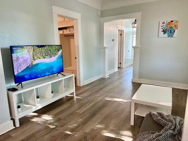a view of entryway with wooden floor