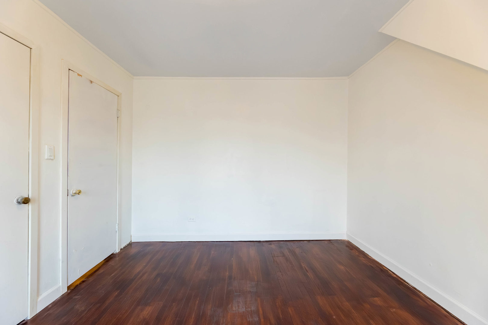 1908 South 23rd Avenue Maywood, IL 60153 - Photo 19 of 37 a view of an empty room with wooden floor