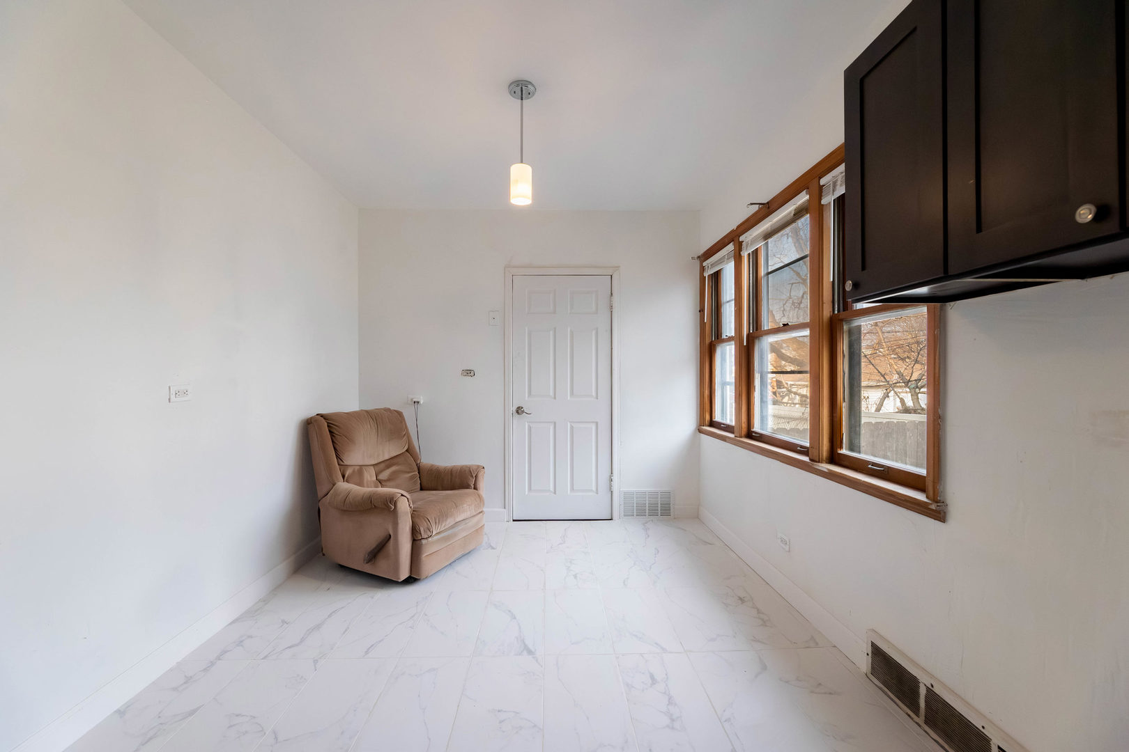 1908 South 23rd Avenue Maywood, IL 60153 - Photo 8 of 37 a view of room with window and hallway