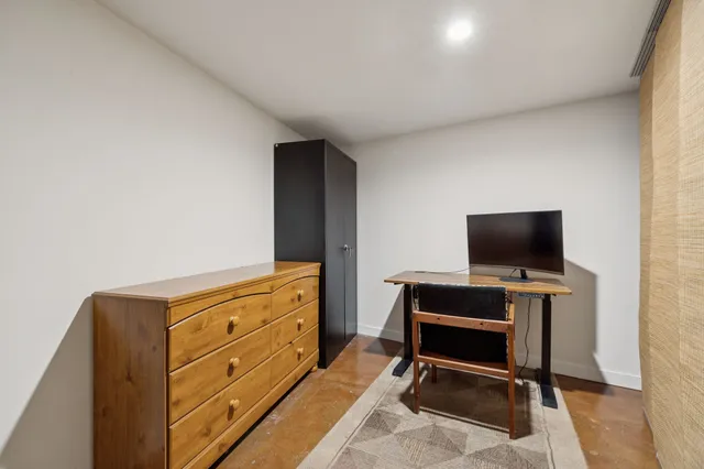 a room with furniture and flat screen tv